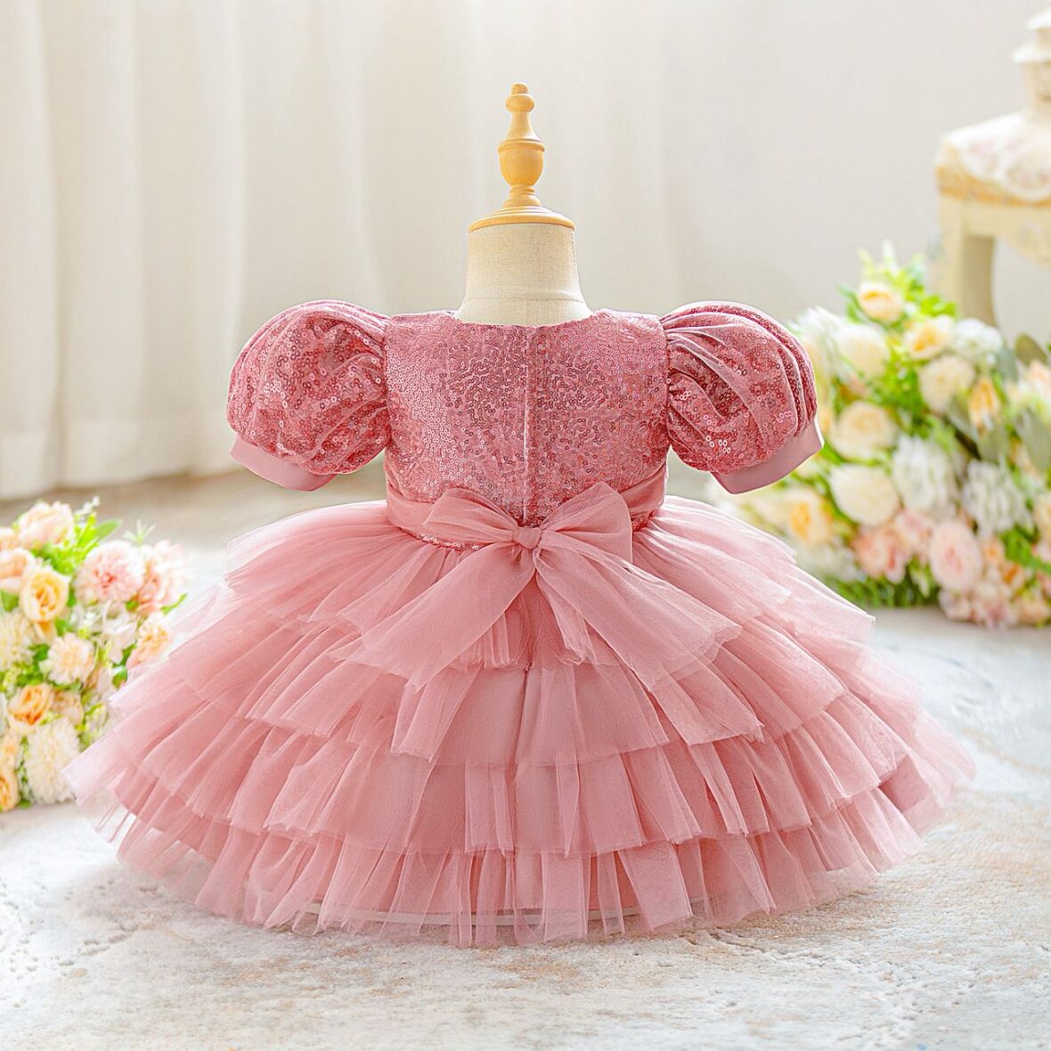 “Baby Girls Pink Tulle Dress with Glitter Sleeves and Bow Waist (2)